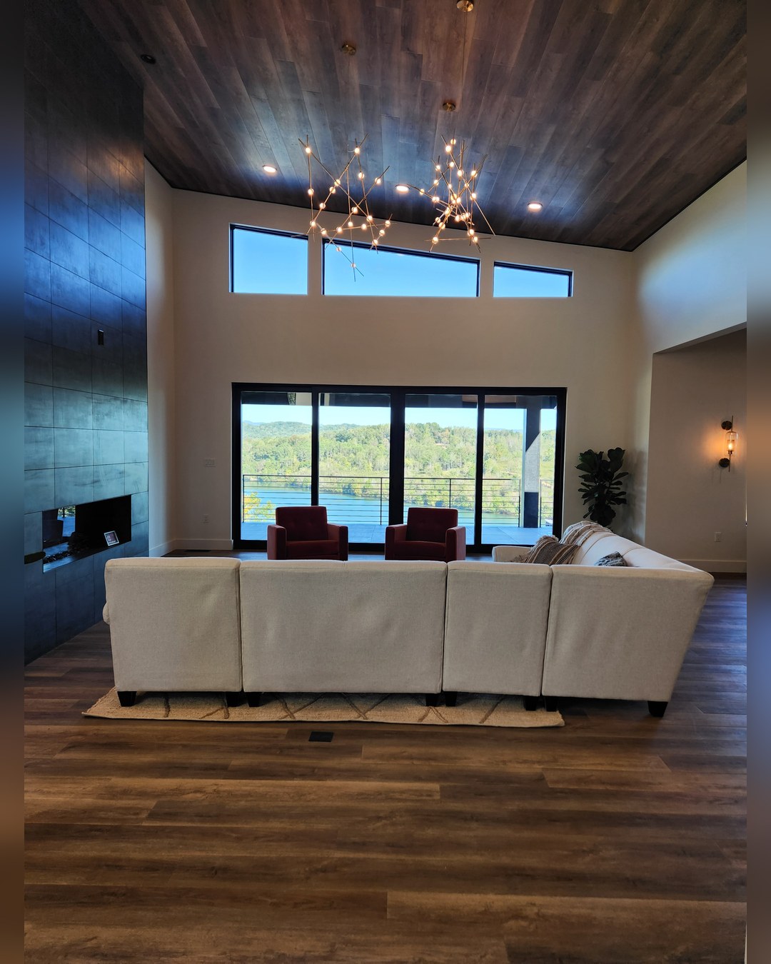 Living room with clerestory glass and a lake view