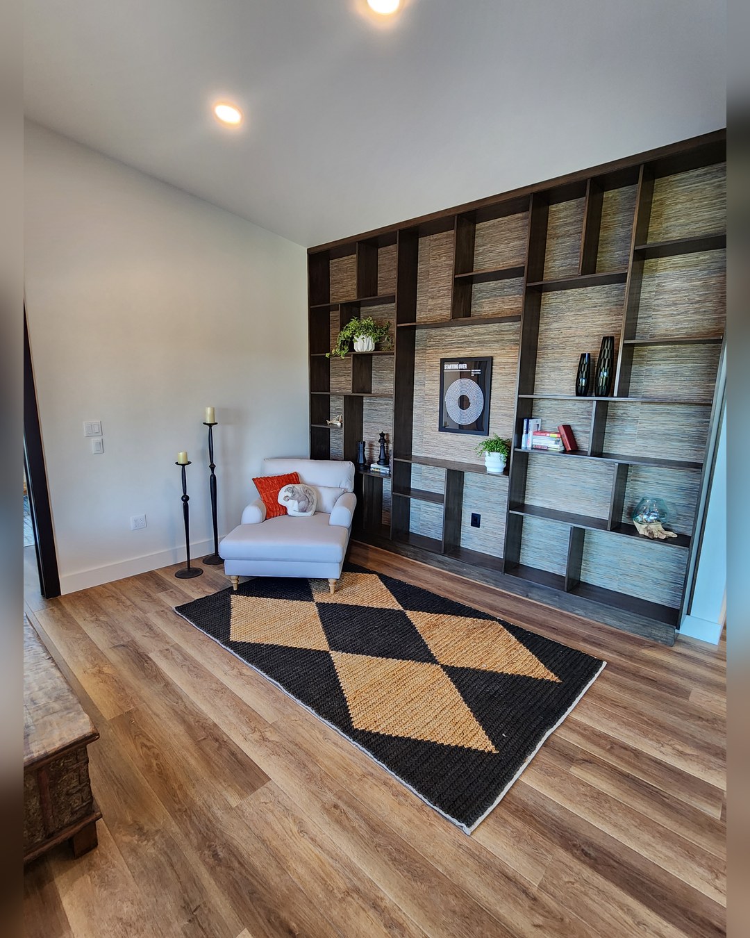 Built-in shelving and oak floors