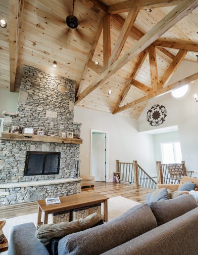 dobro 3 custom home living room with stone fireplace