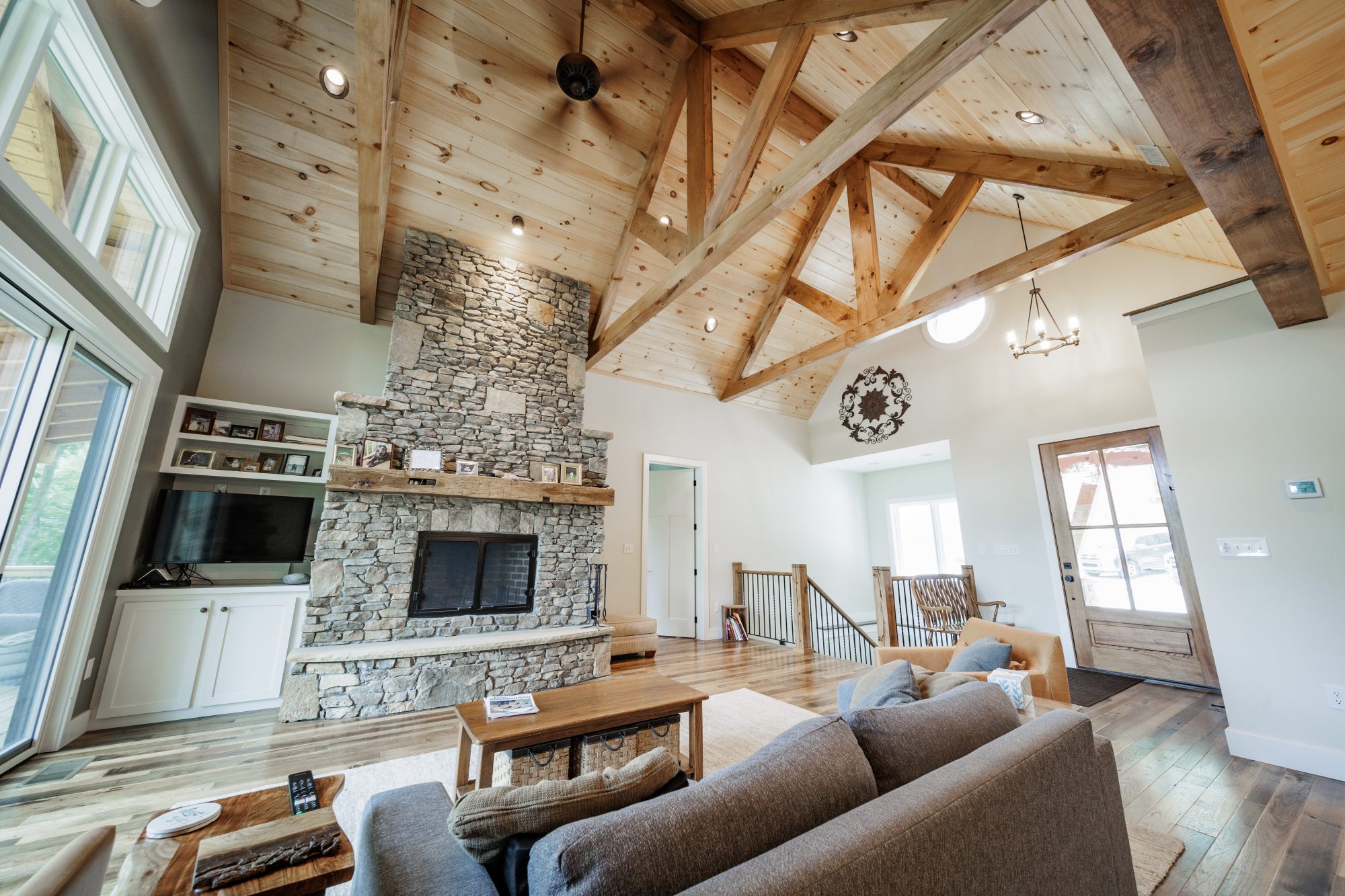 dobro 3 custom home living room with stone fireplace